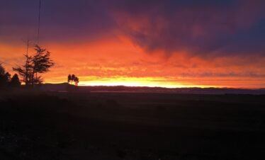 Sunset over Lake Titicaca admired from guesthouse in Luquina Chico Puno Peru
