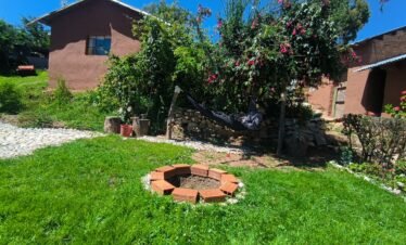 Traditional courtyard of community guesthouse in Luquina Chico with Lake Titicaca views in Puno, Peru