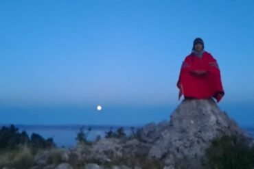 Sunrise over Lake Titicaca with the moon